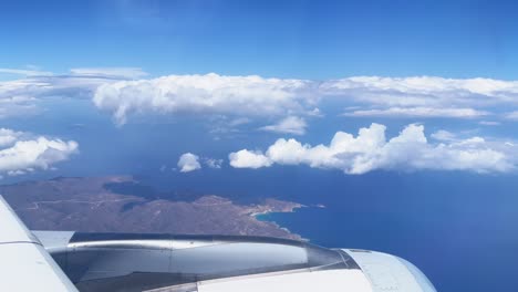 aerial view of coastal landscape from airplane window