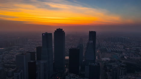 panoramic cityscape with skyscrapers at sunset