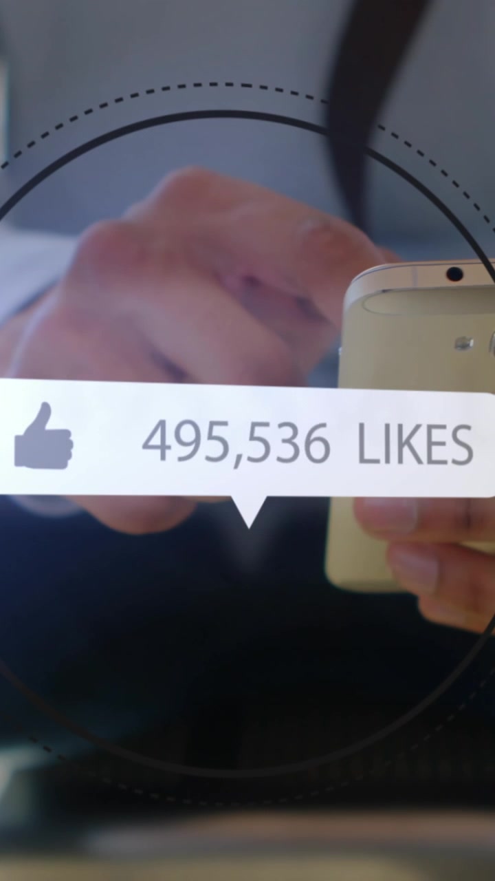 Animation of likes icon with increasing numbers over midsection of businessman using cellphone