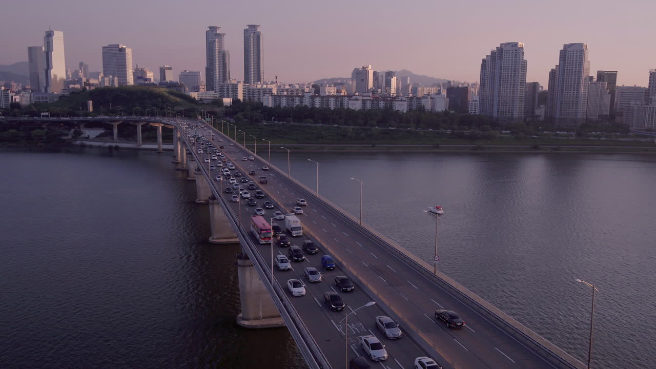 Aerial View of Traffic on a Bridge in Seoul at Sunset