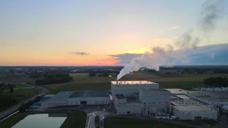 Flying-toward-a-factory's--rising-steam