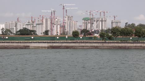 Buildings-construction-on-the-coastal-line-of-the-sea-under-hot-gloomy-day