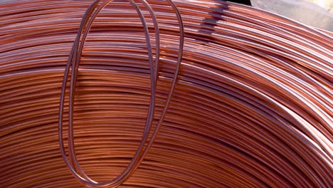 closeup of copper cable being rolled up in preparation for shipment at the factory