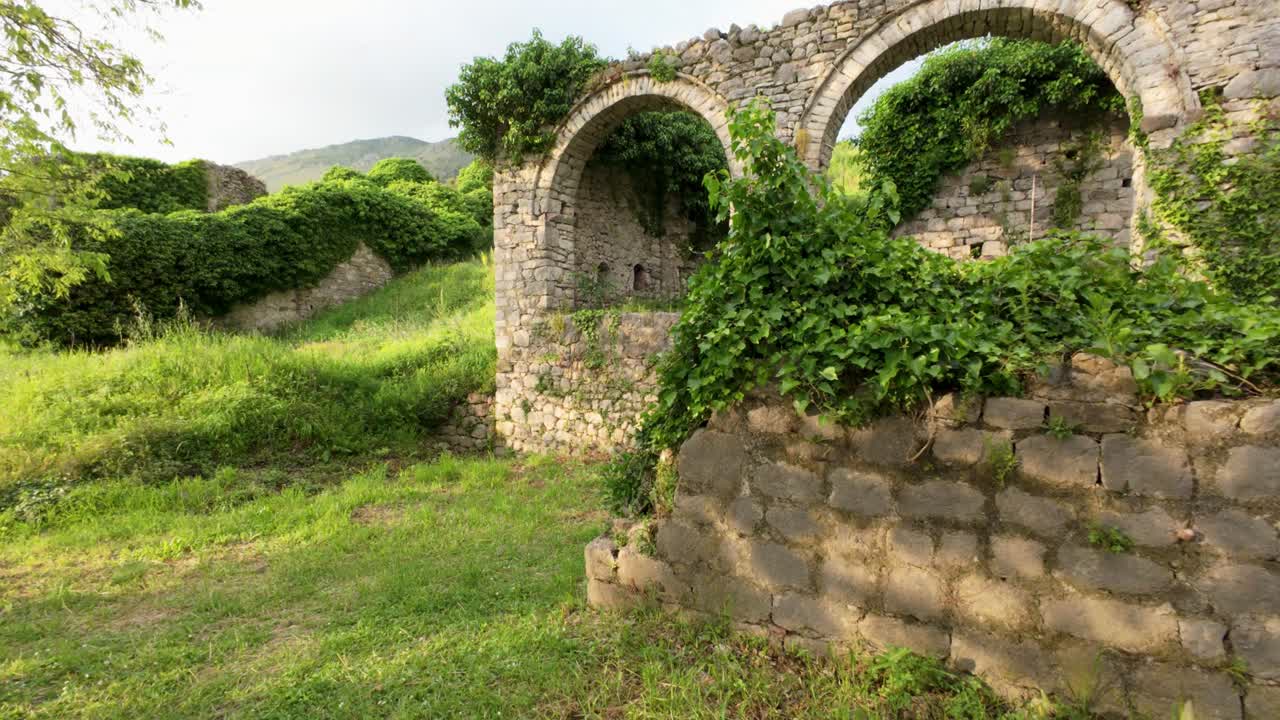 Sunset Over Ancient Stari Grad Bar Montenegro in Summer Featuring Castle and Historic Buildings