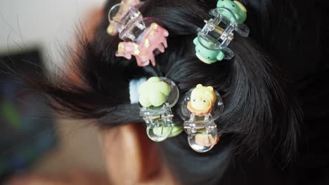 cute hair clips in a ponytail