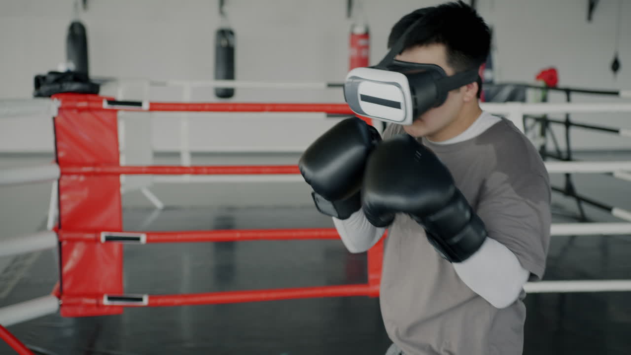 Man using VR headset for boxing training in a gym
