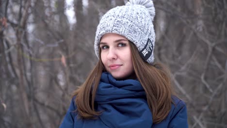 woman smiling in winter landscape