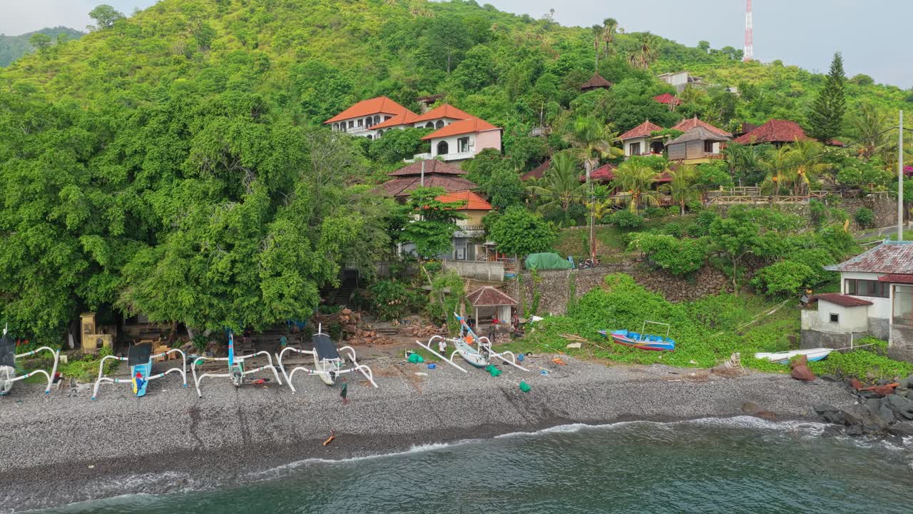 Aerial view of jukung fishing boats on amed beach in bali