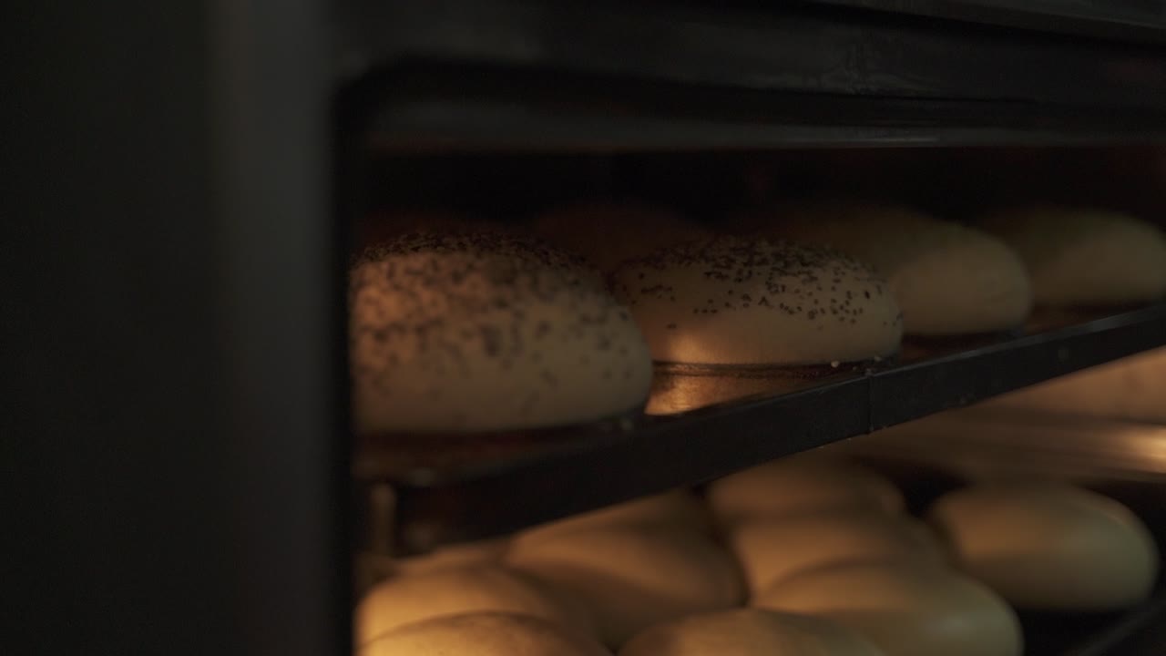 Close up inside an oven where bread is being baked seen in slow motion