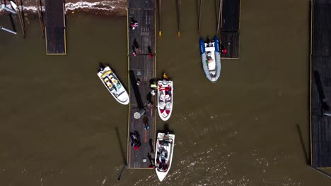 aerial view of boats preparing to sail on a spring morning