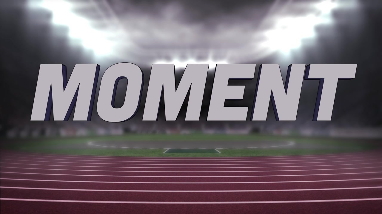 Glowing floodlights lighting up swirling clouds at stadium, MOMENT text holding above track field
