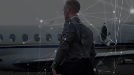 animación de redes de conexiones sobre hombre de negocios caucásico caminando en el aeropuerto