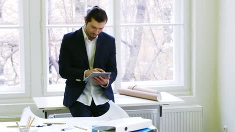 Businessman-using-digital-tablet