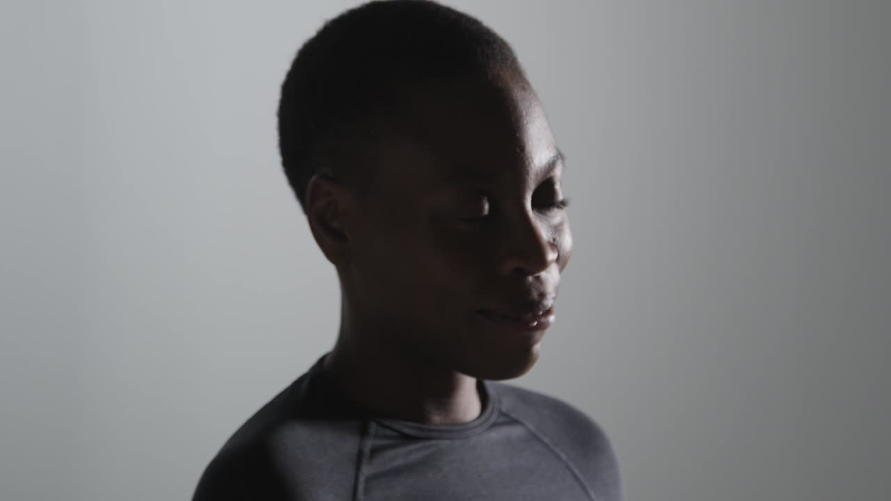 Close Up Studio Shot Of Woman Wearing Gym Fitness Clothing Drinking Water After Exercise 1