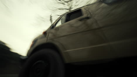 van driving through scenic winter landscape