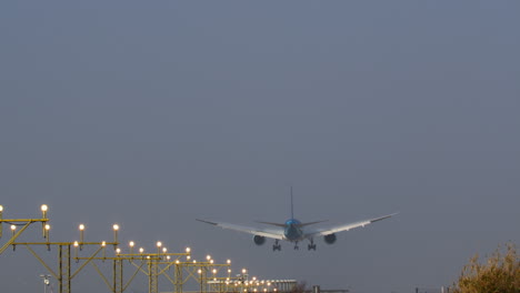 airplane landing in fog at night