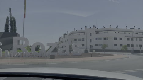 sign of las rozas, madrid taken inside the car