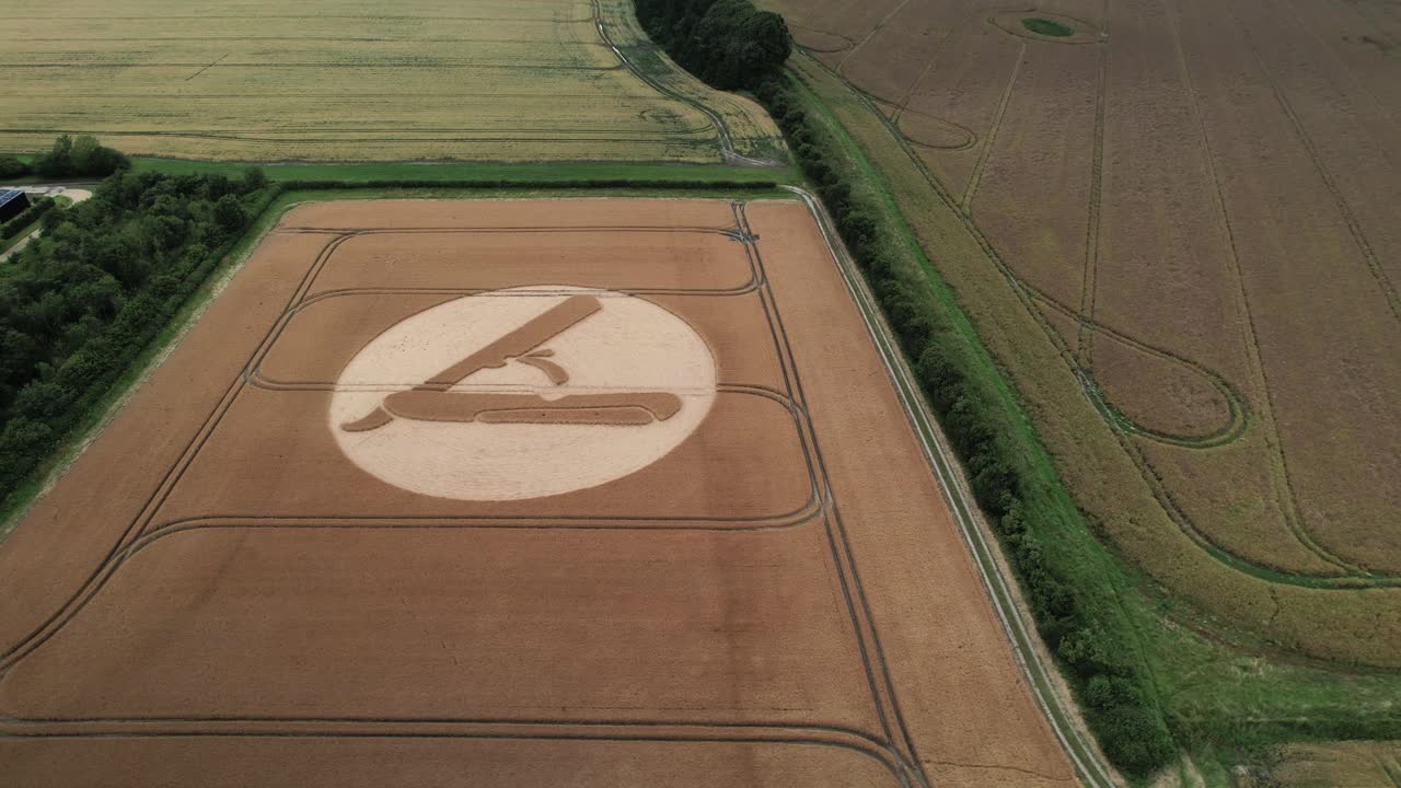Aerial view orbiting cut throat razor crop circle pattern on Hackpen hill, Swindon 2023 farmland
