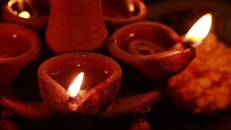 Close-up-video-of-a-beautifully-lighting-a-lamp-flickering-in-the-dark