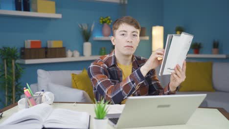 student who likes to study. makes positive gesture to the camera.