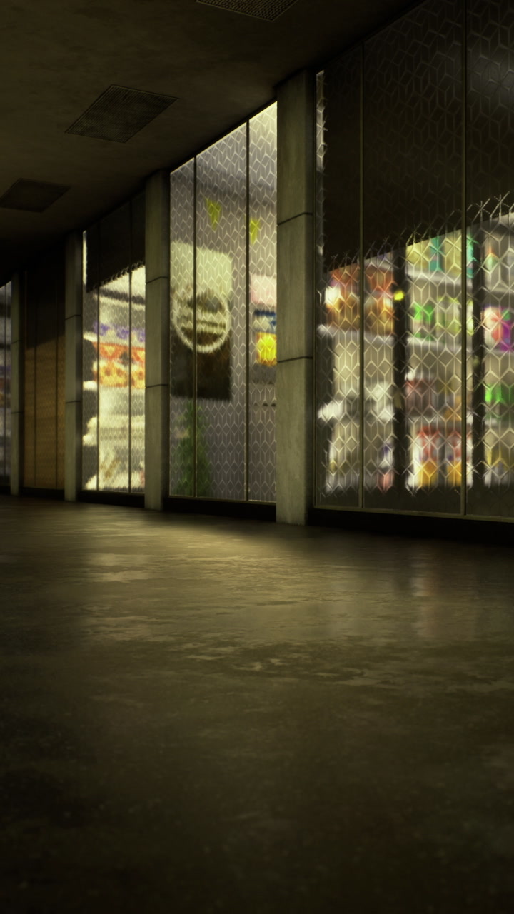Storefront at night with lights reflecting on the floor in a shopping area