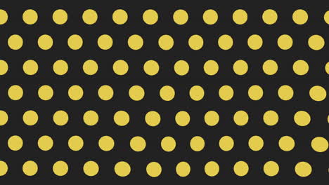 bold and playful black and yellow polka dot pattern with unique variations