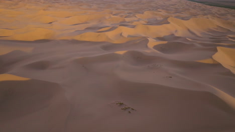 sunrise over the sand dunes of gobi desert in mongolia - drone shot