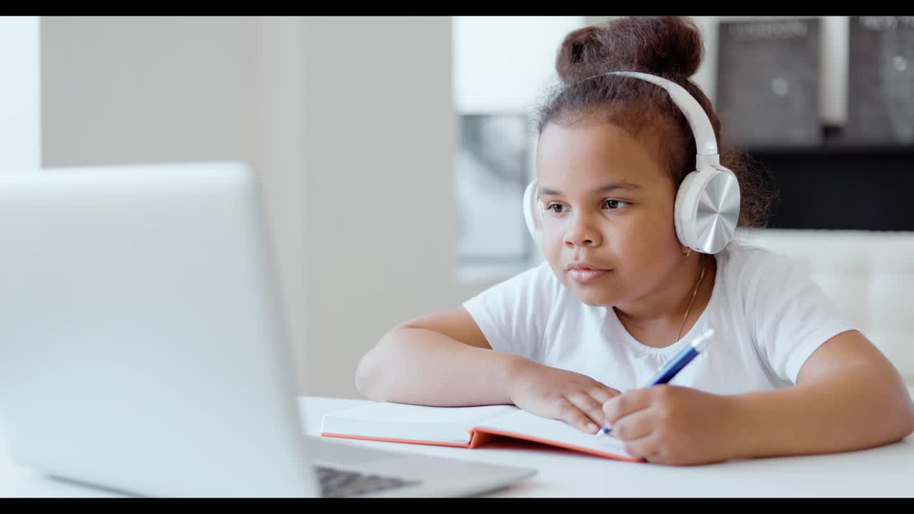 Young Girl Studying Online