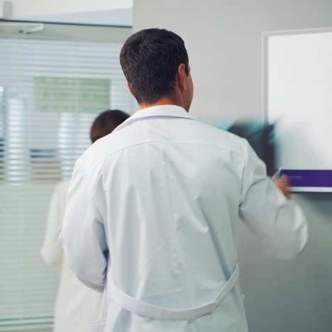 doctor reviewing x rays