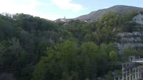 abandoned-cement-factory-monument-in-the-middle-of-nature-drone-4k