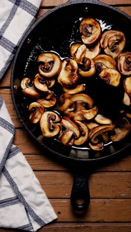 sautéing mushrooms in a cast iron pan