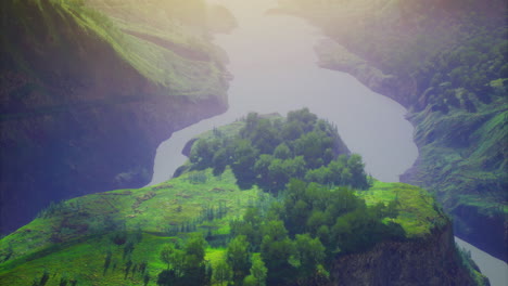 lush green landscape with winding river and forested island at sunrise