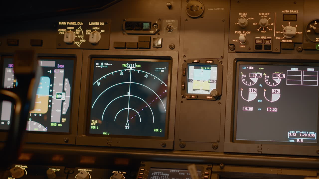 Radar compass and windscreen on dashboard in cockpit