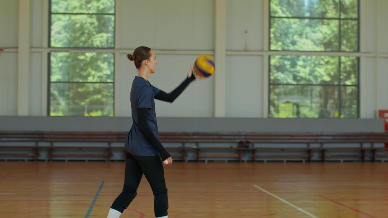 Volleyball players practicing on the court