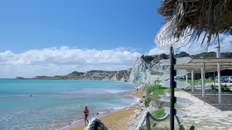 beautiful beach in greece with turquoise water and white cliffs