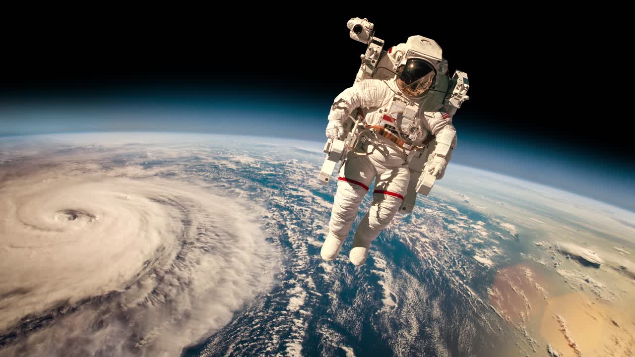 Astronaut in outer space against the backdrop of the planet earth. Typhoon over planet Earth.