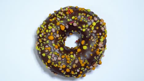 sweet donuts rotating on a white background. traditional american sweetness