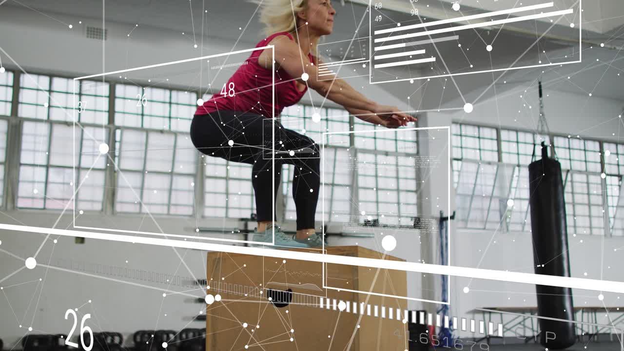 Female athlete driving off floor, landing on plyo box while fitness overlays tracking jump power