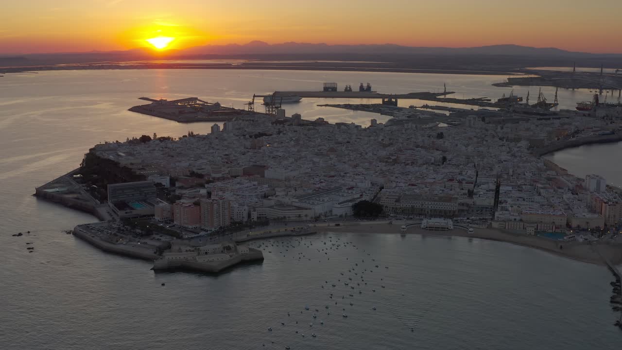 Aerial Sunset View of Coastal City with Port