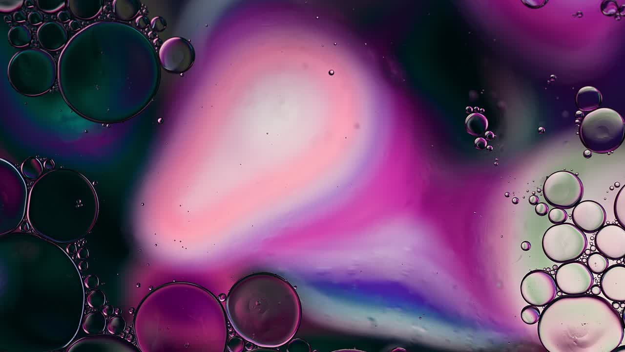 Abstract Colorful Food Oil Drops Bubbles and spheres Flowing