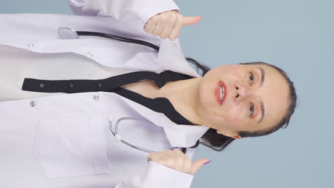 Vertical-video-of-The-doctor-looks-at-the-camera-and-gives-advice.