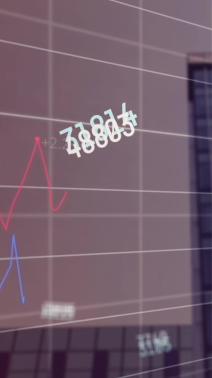 Animation of changing numbers and statistical data processing against tall building