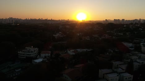 Flying-towards-the-sunset-in-wooded-neighborhood-in-São-Paulo---Brazil-3