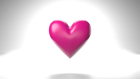 objeto en forma de corazón rosado pulsante sobre fondo blanco.
