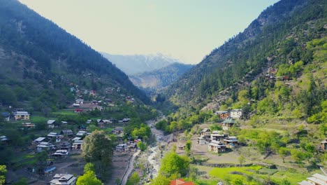 breathtaking view of kashmir valley and mountains on the distance of a small village called katha piran
