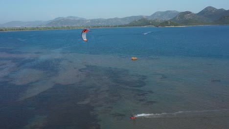 kite surfing on neretva valley, adriatic sea - aerial drone view