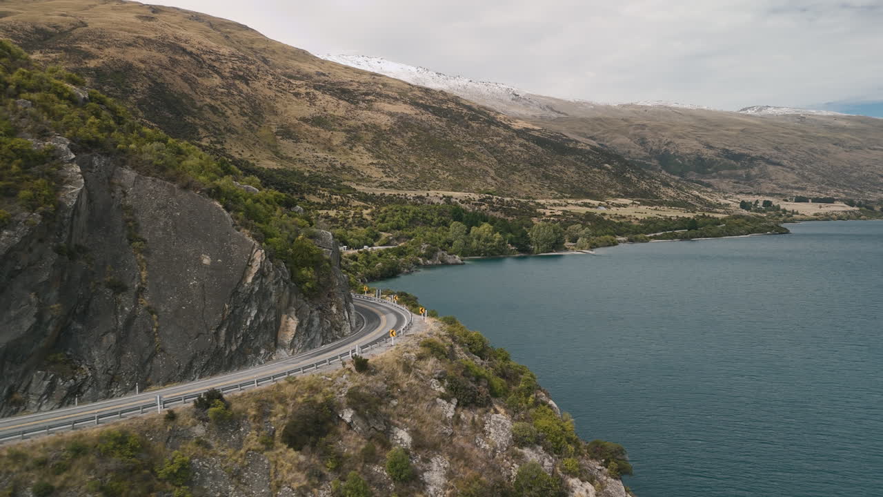 Scenic Road Trip Along a Mountain Lake