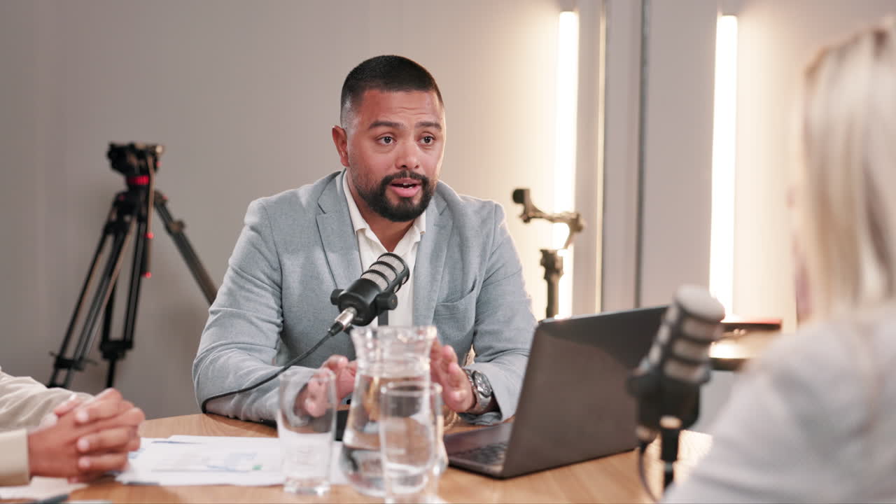 Podcast recording with a man in a business suit