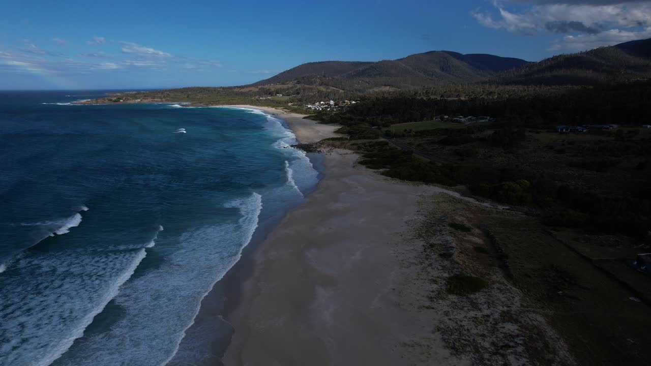 Ocean Waves Rolling On The Shore Of Steels Beach In Tasmania, Australia - Drone Shot
