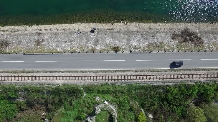 Aerial View of Road, River, and Train Tracks